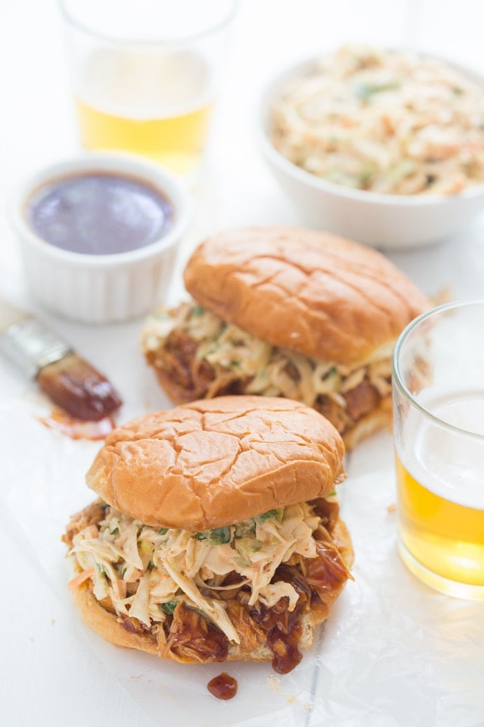 Crockpot BBQ Chicken Sandwiches - easy and perfectly tender, flavorful, and smoky, these are new standbys in our meal plan! // 40 Aprons