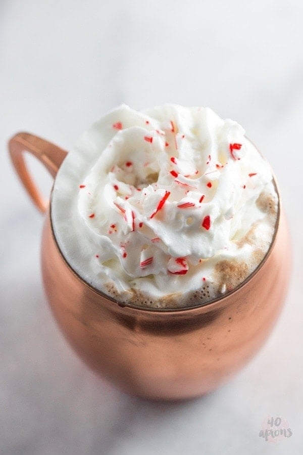 Spiked peppermint hot chocolate. So rich and creamy with the perfect boozy peppermint kick.. truly a merry Christmas! // 40 Aprons