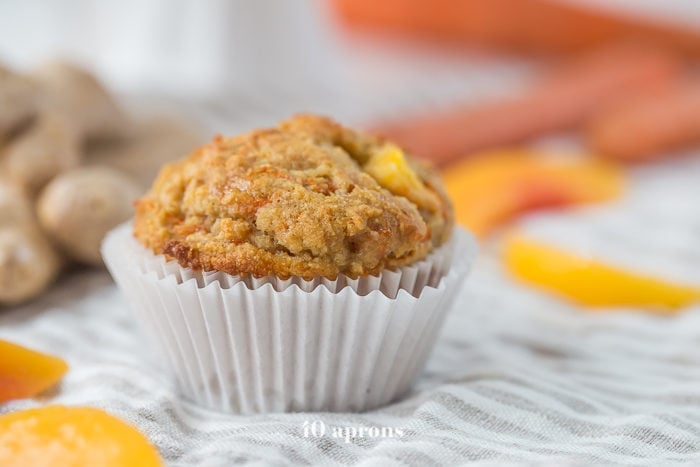 These peach ginger paleo muffins are moist and tender, full of fruity, fresh peaches and earthy ginger. The best thing about these paleo muffins? They don't taste like they're paleo! Grain-free, gluten-free, and refined sugar-free, these make an awesome paleo breakfast, too.