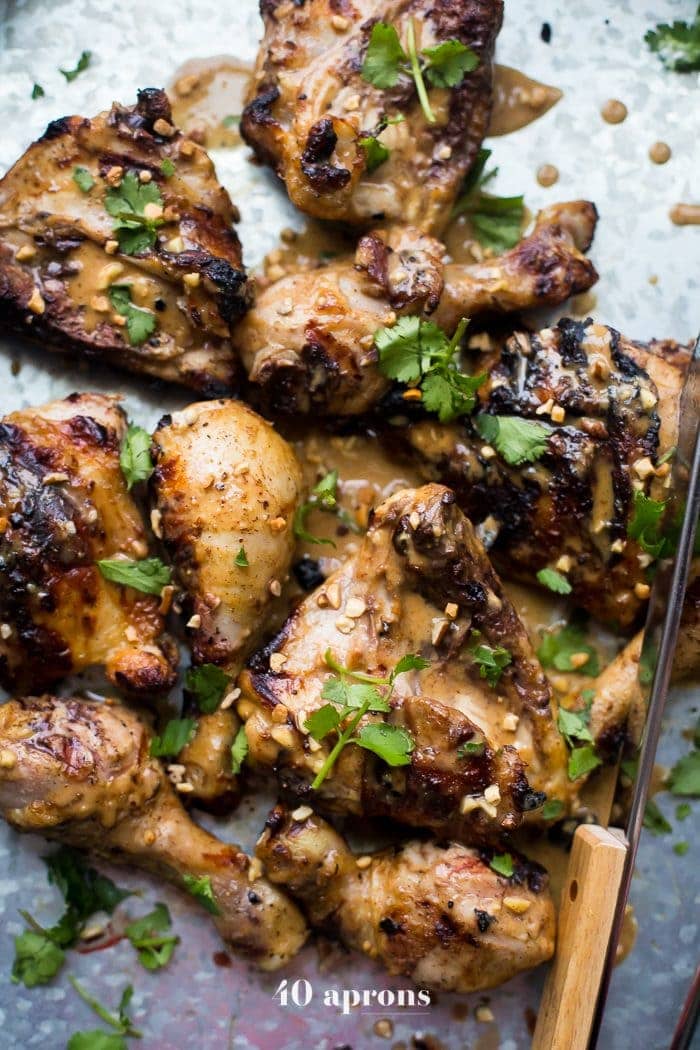 This grilled peanut-free chicken satay tastes just like the Thai classic but without any peanuts. It comes together quickly and won't heat up the kitchen, making it bound to be one of your favorite grilled paleo or grilled Whole30 recipes. This peanut-free chicken satay is stinkin' delicious!