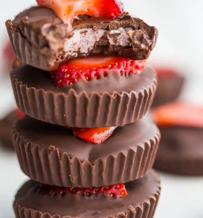 These chocolate strawberry coconut butter cups are a delicious paleo dessert. Rich chocolate cups stuffed with homemade strawberry coconut butter? Kind of my your new favorite vegan chocolate cups, pretty sure! These paleo chocolate cups made with only five ingredients but are super impressive. Yum!