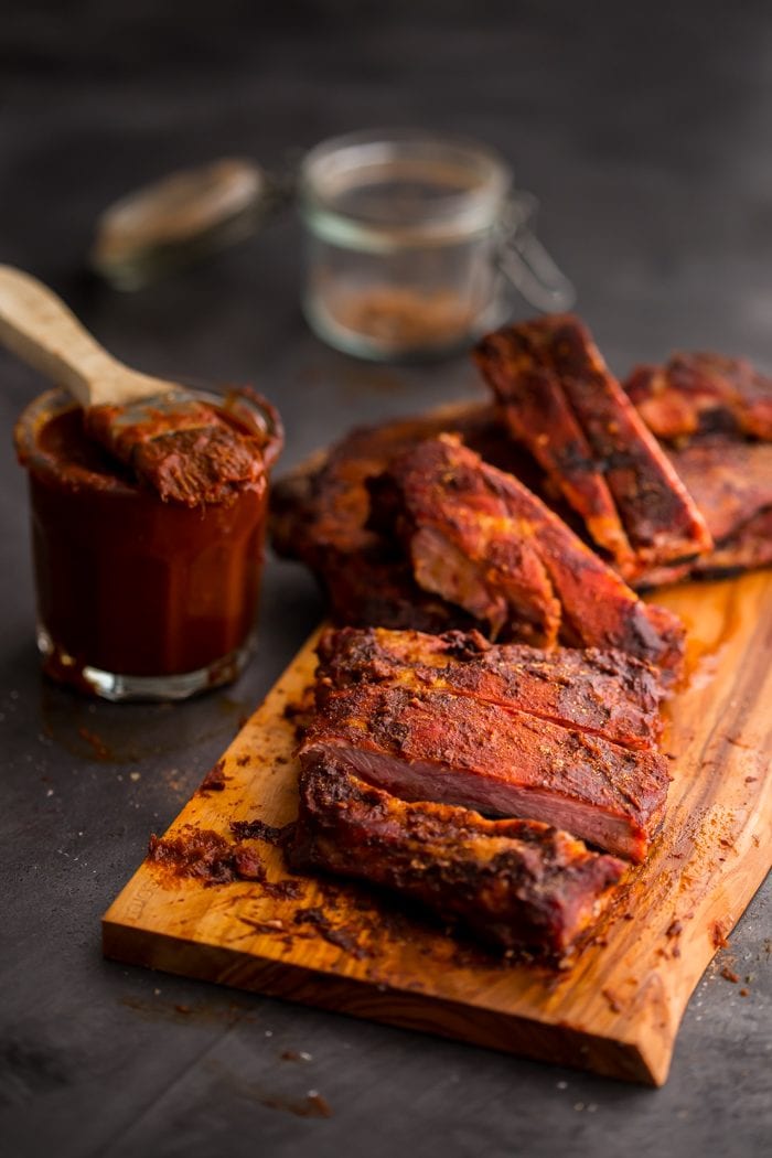 These Whole30 ribs are easy and cooked on the grill, making them a great Whole30 dinner! Smoky, spicy, and full of flavor, they're delicious with my Whole30 BBQ sauce. Definitely the perfect Whole30 ribs or Whole30 dinner now that football season is upon us!