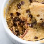 This paleo microwave cookie with chocolate chips is a perfect paleo microwave dessert! It takes only a few minutes and a couple dishes to make and produces a rich and tender cakey chocolate chip cookie that's healthier for you. It's certainly my favorite paleo microwave dessert so far, and I think this paleo microwave cookie with chocolate chips will become a regular in your repertoire!