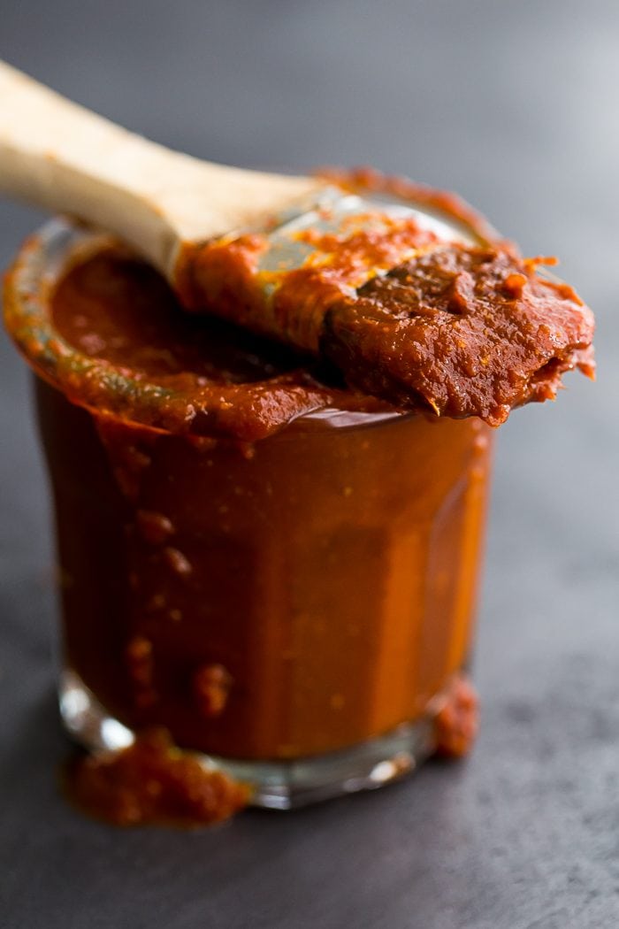 This Whole30 BBQ sauce is a delicious Whole30 condiment. Perfect on ribs, pulled pork, or chicken, this Whole30 BBQ sauce is spiced with chipotle powder and lightly sweetened with coconut aminos. A jar of this Whole30 BBQ sauce in the fridge will mean plenty of simple, flavorful Whole30 dinners!