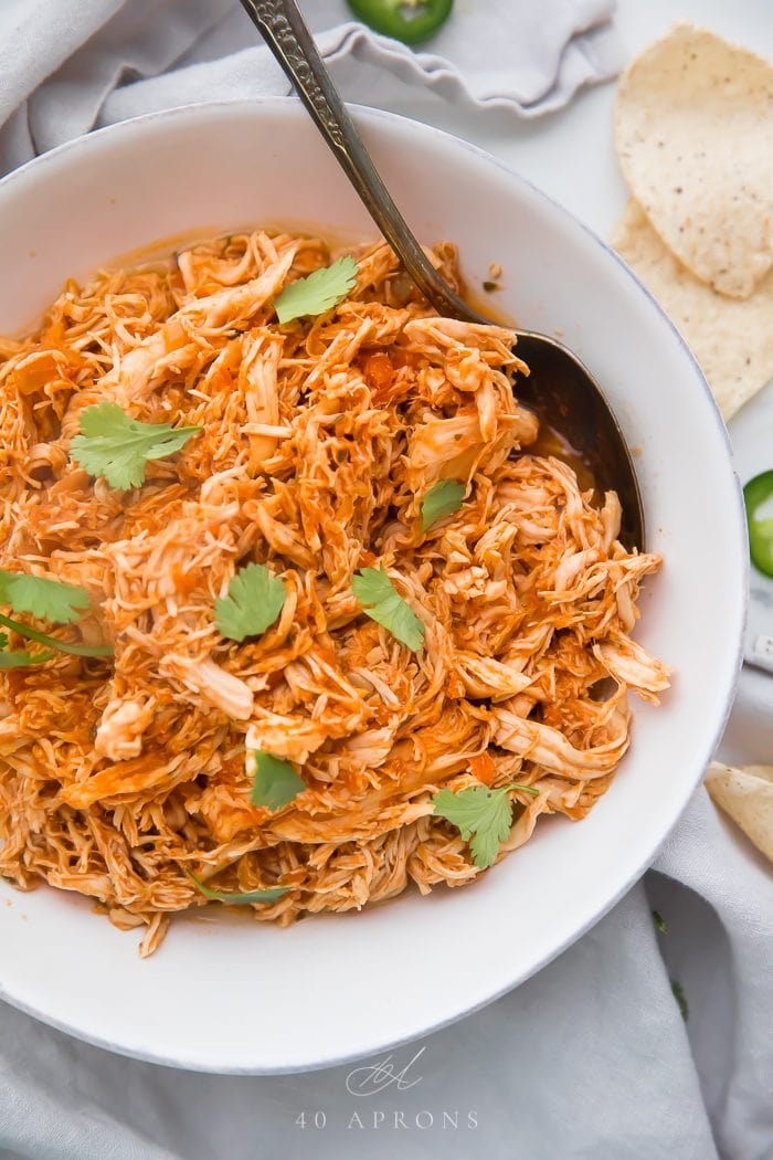 Mexican shredded chicken in a white bowl