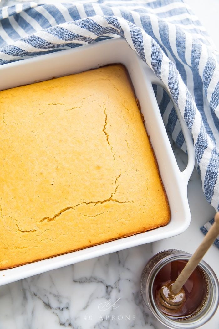 Baked cornbread in a white dish
