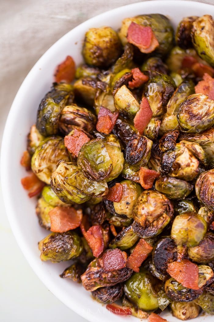 Sprouts and bacon in a serving dish