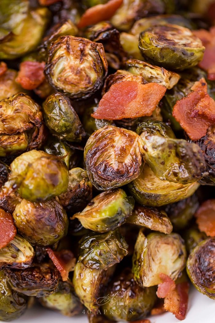Close up of balsamic Brussels sprouts served with bacon