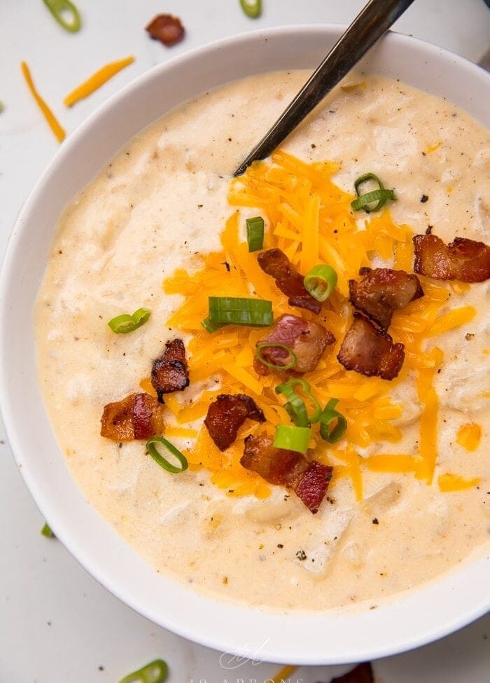 Soup topped with cheese and bacon