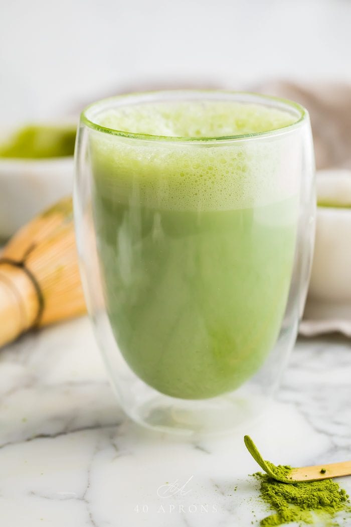 Matcha latte in a double walled glass