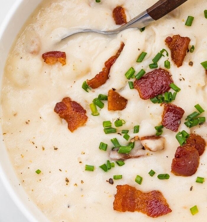 Whole30 potato soup up close with bacon and chives