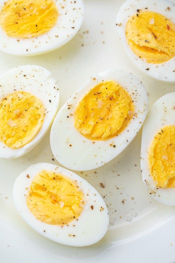Air fryer hard boiled eggs on a white plate