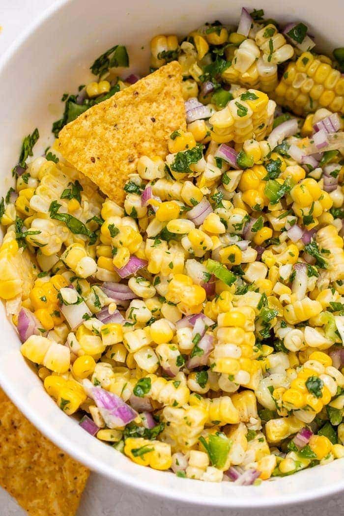 Close-up of corn salsa ina bowl with chips