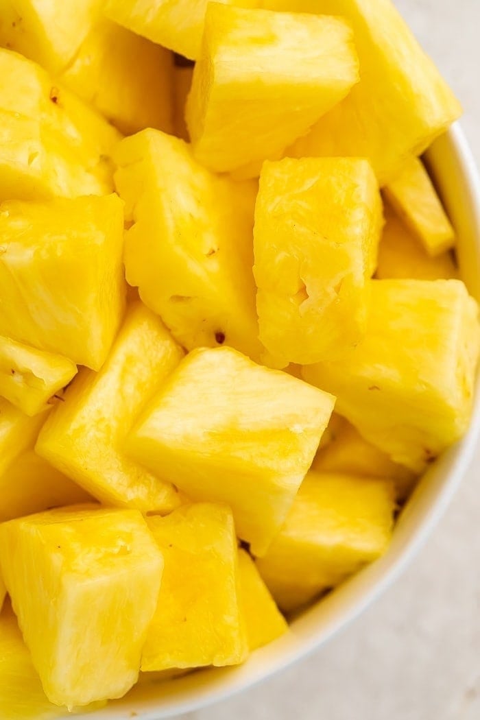 Close-up of chunks of pineapple in a bowl