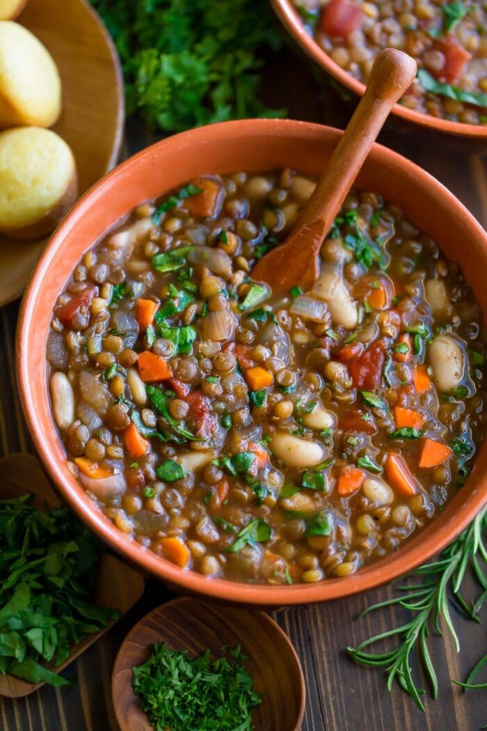 A red bowl of vegetarian slow cooker italian lentil soup