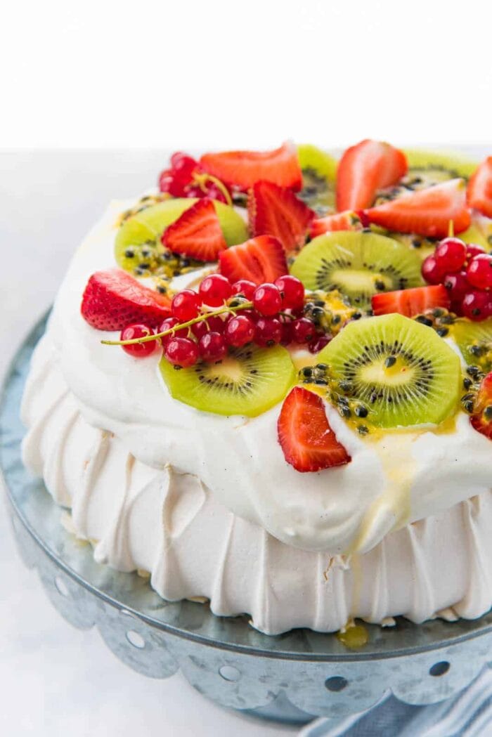 Egg white pavlova topped with strawberry and kiwi
