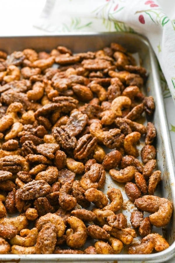 Sweet spicy Christmas nuts on a baking sheet