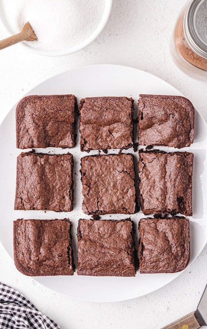 9 egg white brownies on a white plate