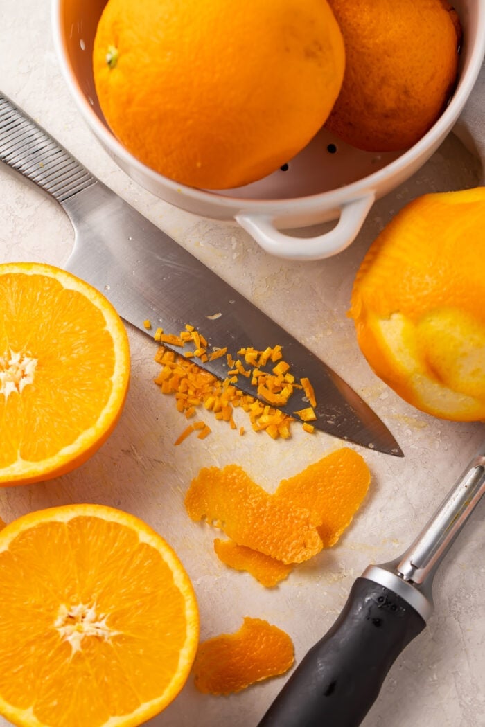 Oranges, orange zest, and a knife
