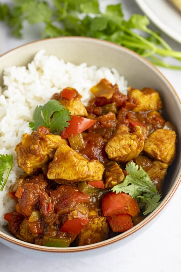 Chicken jalfrezi in a bowl with white rice