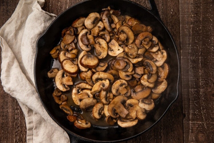 Sauteed mushrooms in large skillet