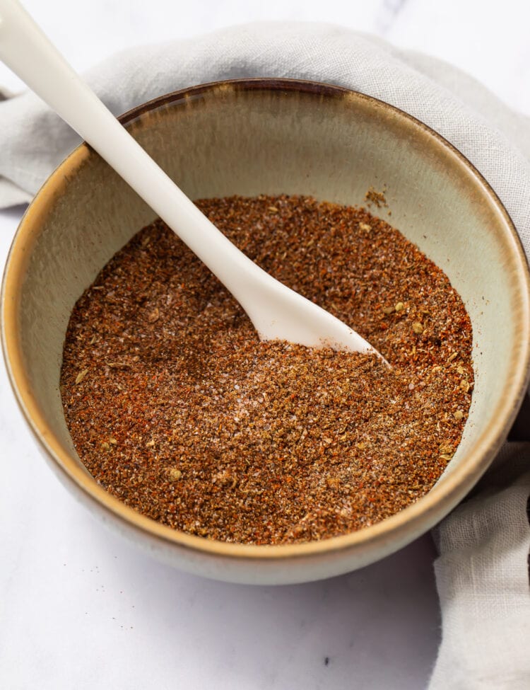 Keto taco seasoning in a bowl with a white spoon