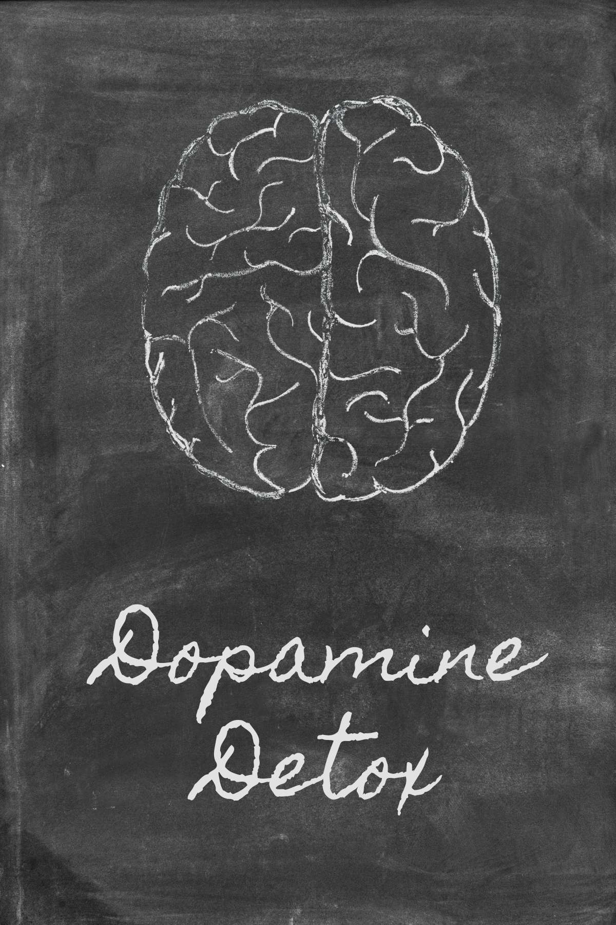 A line drawing of a brain on a chalkboard with the words "dopamine detox" written in chalk beneath it.